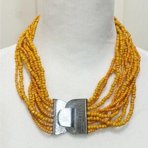 VintageMulti strand seed bead necklace with natural horn toggle